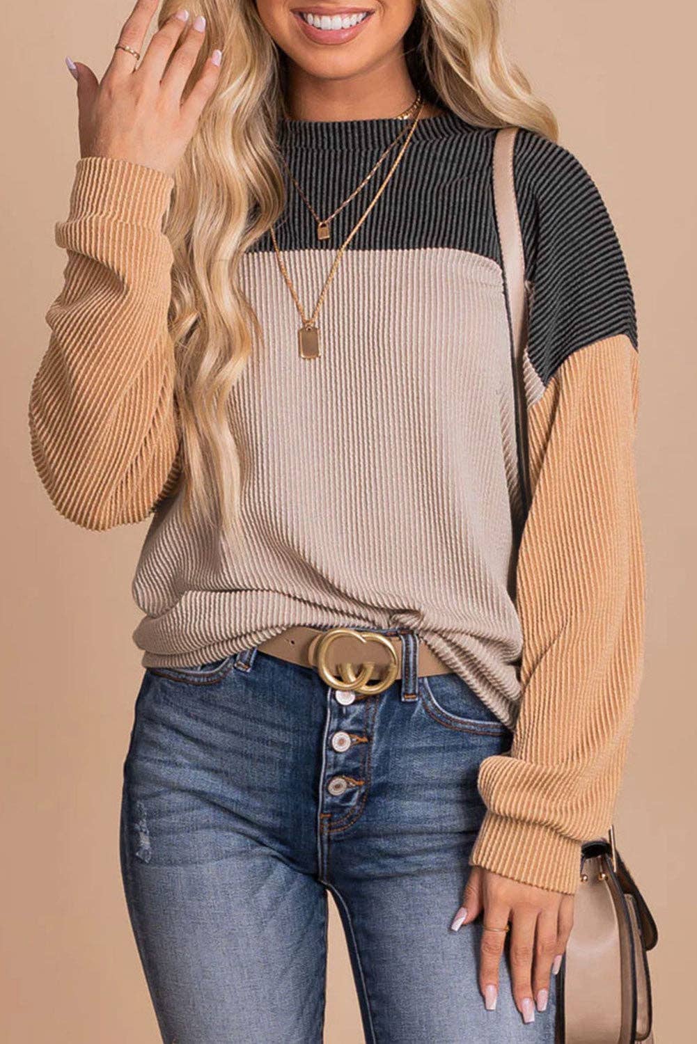 STANDOUT Color Block Top - Beige and Charcoal by Lovesoft $25.00 This casual top effortlessly achieves a chic and effortless look * Stand out from the crowd with its bold and eye-catching combination of color block. With its ribbed texture, you'll enjoy a