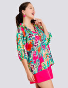 Colorful floral blend top by Umgee Plus, perfect for curvy girls, stylish for work or special events.