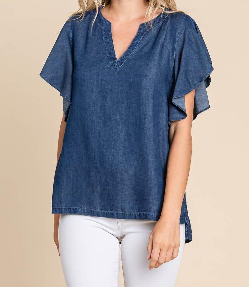 BILOXI BLUES TOP - Trendy Boutique Blouse by Lily Sky by Lily Sky $38.00 Discover comfort and style with the BILOXI BLUES TOP. Trendy chambray denim, v-neck, and flutter sleeves. Shop your size at our boutique today! Teal Tiger Boutique