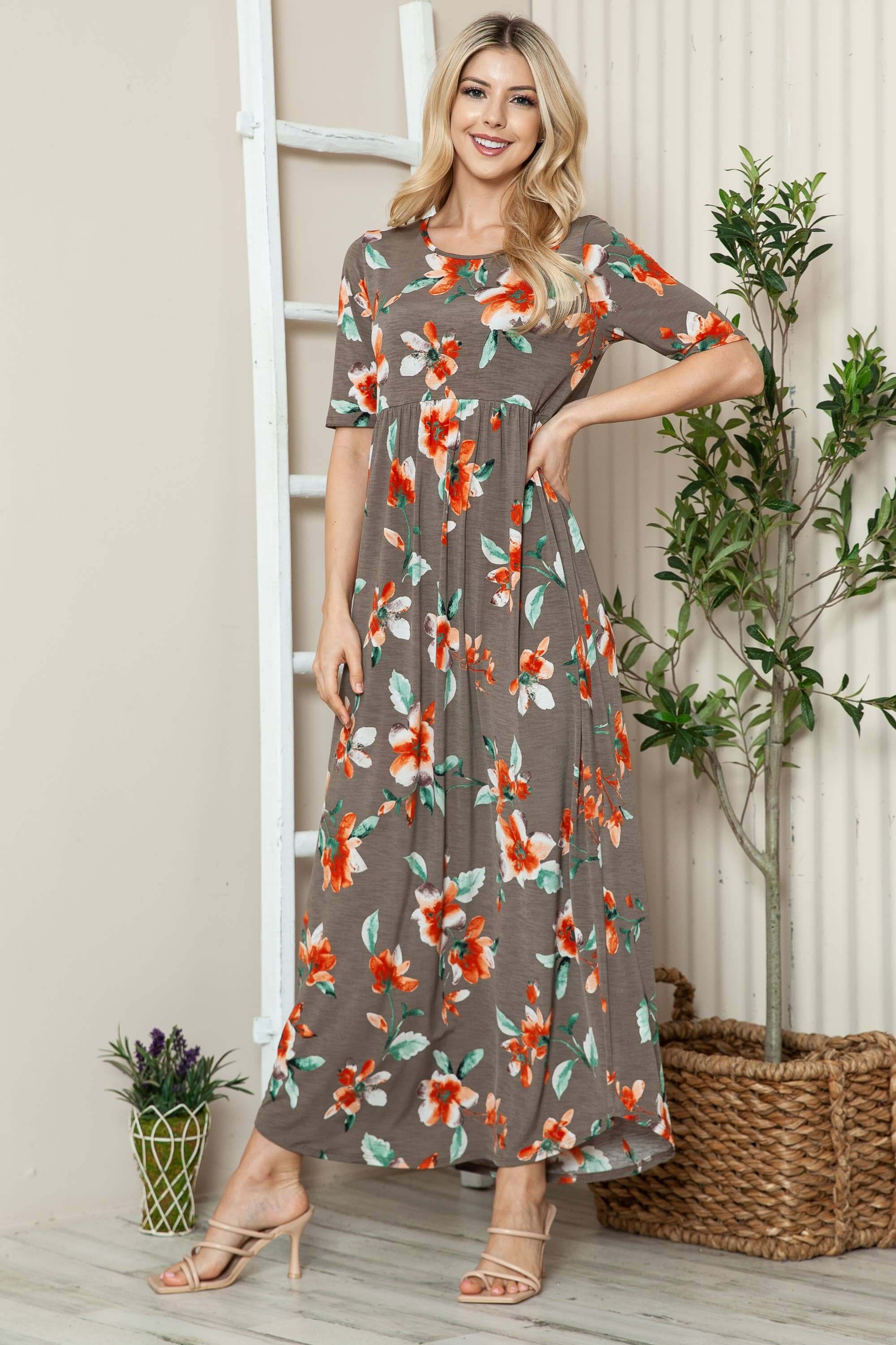 DA1556 Floral Shirred Maxi Dress for women, featuring short sleeves and a flowy silhouette.