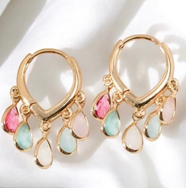 Stained glass earrings with gold hoops and colorful teardrop charms in pink and blue hues.
