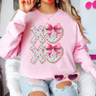 LOVE YOU MORE CREWNECK featuring pink XOXO floral design and bows, perfect for Valentine's styling.
