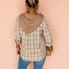 Back view of the DRIFTWOOD DAYS BUTTON DOWN hooded shacket in khaki checkered print.