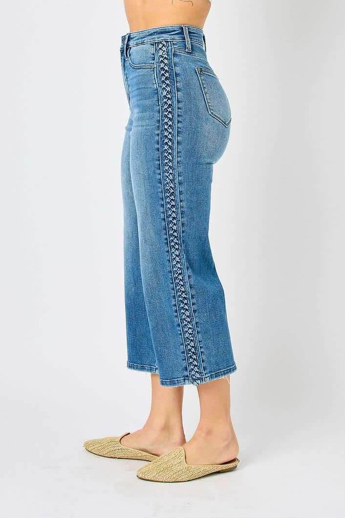 JUDY BLUE braided detail wide leg jeans showing intricate side braid, stylish and flattering fit for a fashion-forward wardrobe.