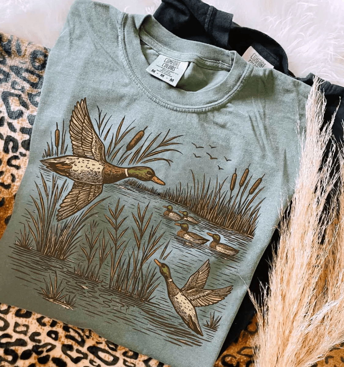 TAKE FLIGHT TEE - The Lattimore Claim featuring a waterfowl graphic on a soft mineral prewashed cotton tee.