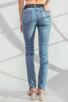 Woman wearing Star Walk Jeans by Easel featuring star patch detail on back pockets, slim fit, stretchy denim, light blue wash.