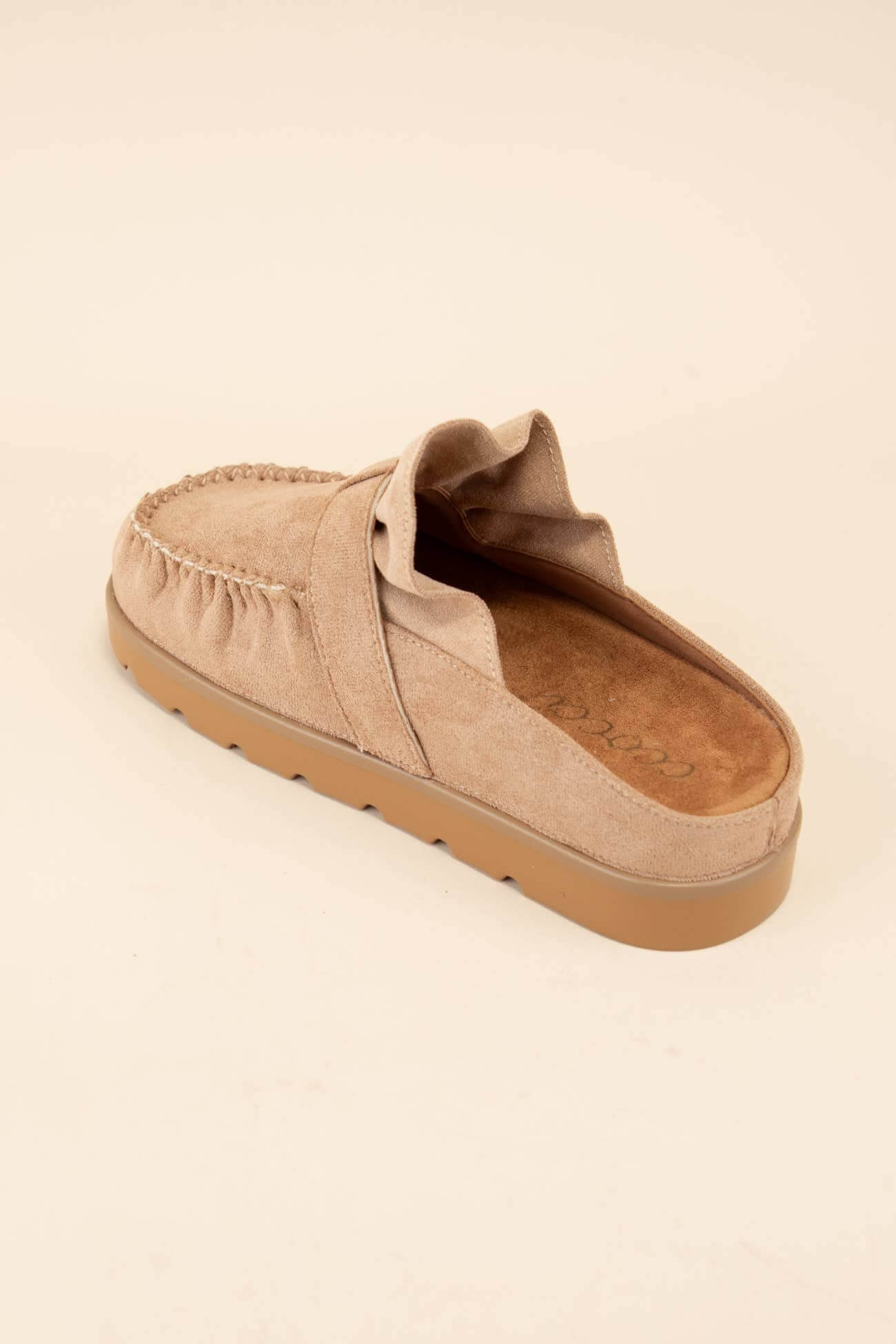 LAIDBACK LUXE SLIDES (Latte) slip-on moccasin mule with ruffle design, displaying chic comfort and modern style.