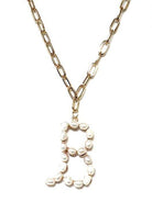 Pearl Essence Monogram Necklace with gold-tone chain, freshwater pearl letter pendant from Avenue Zoe.