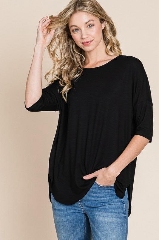 Woman in black Girlfriend Crew by BomBom, featuring half sleeves and a cozy fit, perfect for any outfit.