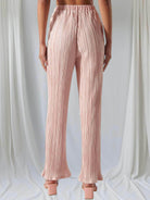 Back view of Sugarlips Soft Touch blush pink plisse pants with high waist and frill detail. Ideal for any occasion.