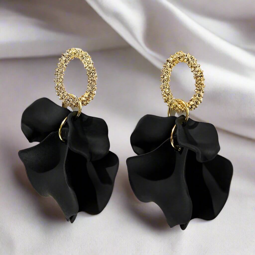 Elegant black ruffles earrings by Vivian-Lu featuring a gold tone circle for a sophisticated touch to any outfit.