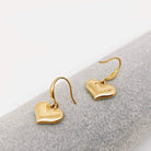 FOREVER YOURS EARRINGS in 18K gold-plated stainless steel, heart-shaped design for classic and romantic style.