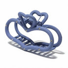 Matte Heart Shaped Stone Accent Hair Claw Clip in soft blue color with rhinestone accents and heart shape design.