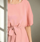 Scallop charm dress in dust rose with belted waist, perfect for dressy events like baby showers.