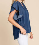 BILOXI BLUES TOP - Trendy Boutique Blouse by Lily Sky by Lily Sky $38.00 Discover comfort and style with the BILOXI BLUES TOP. Trendy chambray denim, v-neck, and flutter sleeves. Shop your size at our boutique today! Teal Tiger Boutique