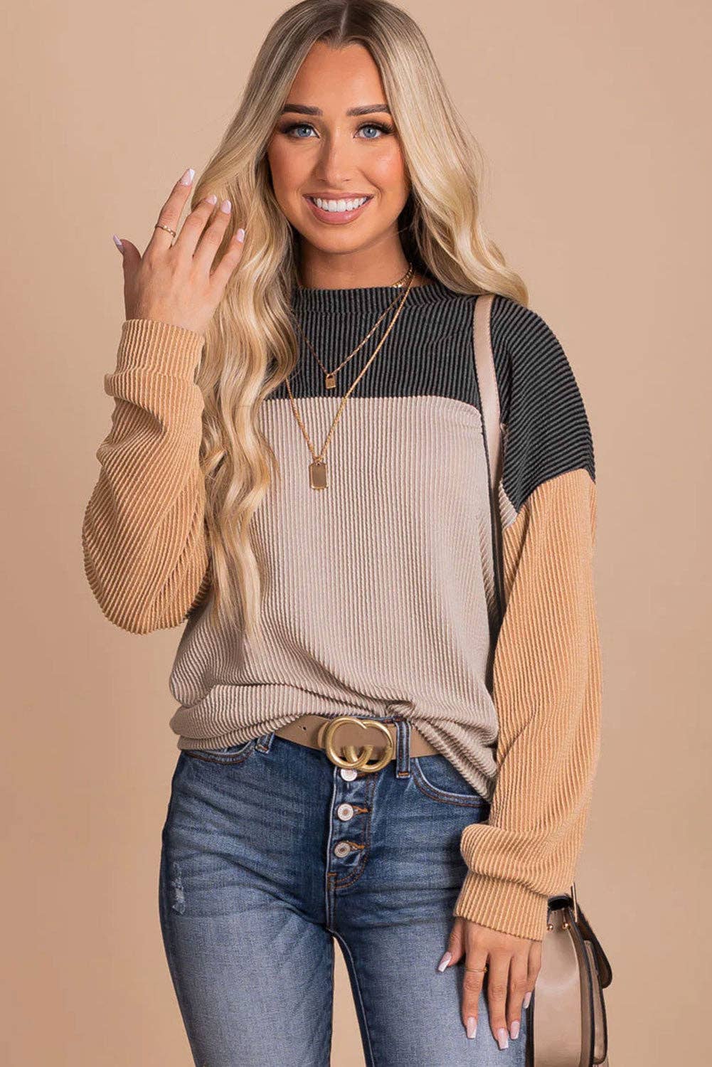 STANDOUT Color Block Top - Beige and Charcoal by Lovesoft $25.00 This casual top effortlessly achieves a chic and effortless look * Stand out from the crowd with its bold and eye-catching combination of color block. With its ribbed texture, you'll enjoy a