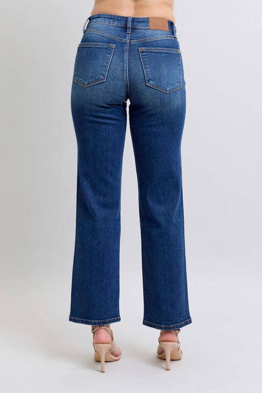 Back view of JUDY BLUE - NOELLE JEANS showcasing high-rise fit and wide leg design in deep dark wash denim.