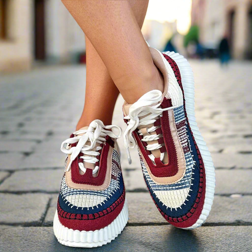 Corkys Adventure Sneakers in burgundy Aztec style with whipstitch detailing, perfect for trendy outings.