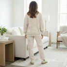 Model wearing the SOFT TERRAIN 2 pc Lounge Set in soft gray and cream camo print, showcasing a relaxed style.