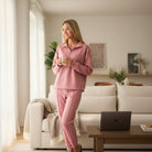 LUXE LEISURE SET - Zenana (winter rose) model showcasing cozy athleisure top and joggers in a stylish living room setting.