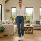 YARA JOGGERS by Risen Denim worn by a model in a cozy living room setting, showcasing a relaxed and stylish look.