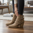 ARISA STRAPPY ANKLE BOOTS in taupe with studded straps and block heels, perfect for edgy chic style.
