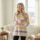 Model wearing EASY LIKE SUNDAY SWEATER holding a mug, showcasing a cozy popcorn-style oversized knit.