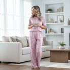 FESTIVE FRILLS LOUNGE SET in soft pink fabric, featuring a relaxed top and pants, perfect for cozy home lounging.