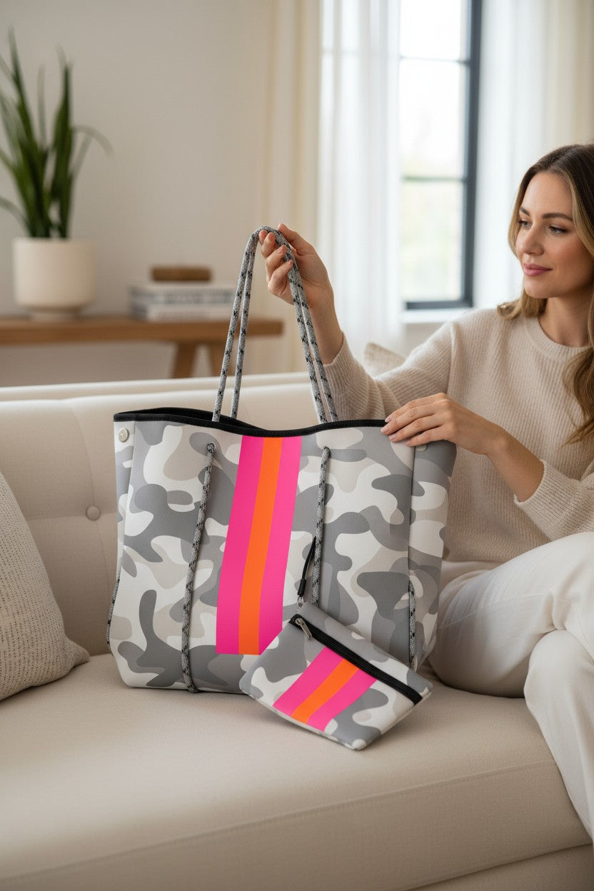 HUNTRESS LUXE 2 PIECE BAG SET featuring a neoprene camo tote and matching pouch in a stylish setting.