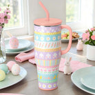 BUNNY TRAIL 40 OZ MEGA MUG - Swig Life with pastel colors, bunnies, and floral patterns on a table setting.
