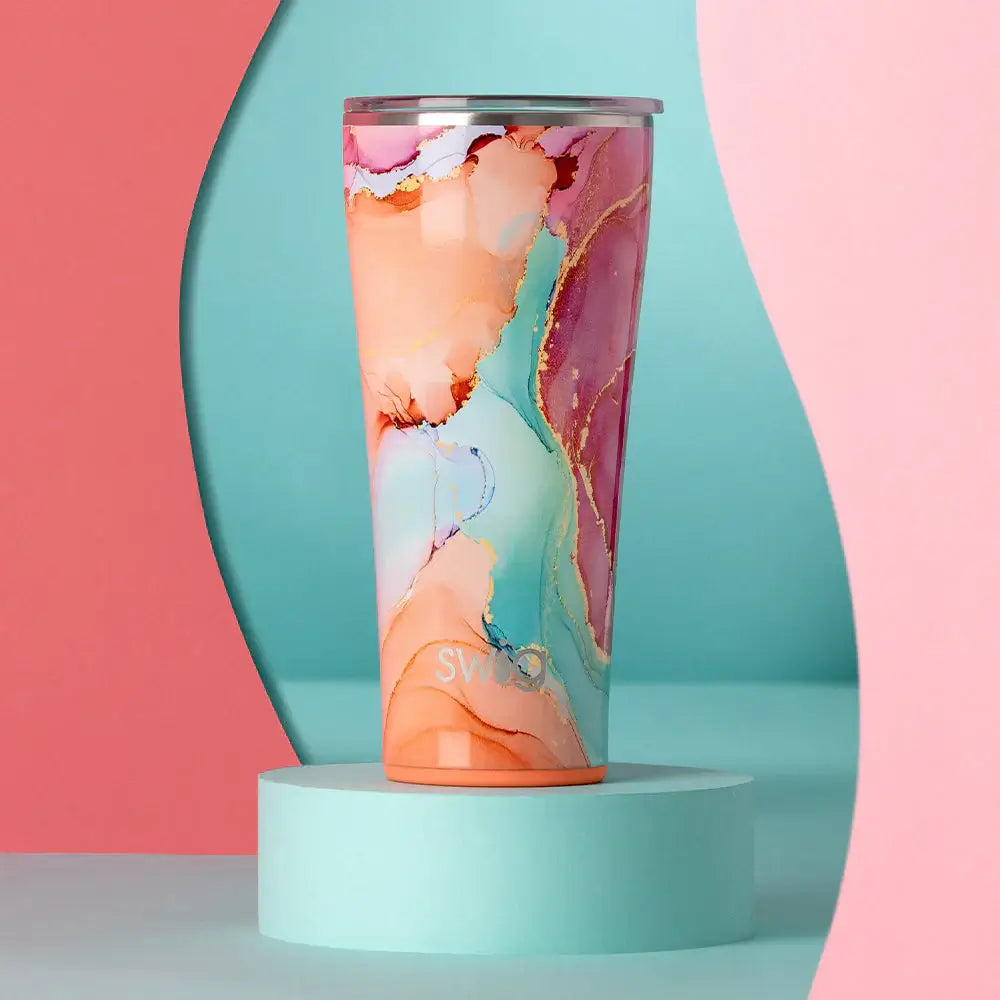 32oz Dreamsicle tumbler with pink, aqua, and orange swirls on a pastel background, ideal for cold or hot drinks.