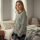 THE PERFECT SPOT Ribbed Top in snow leopard print, perfect for casual outings and everyday style.